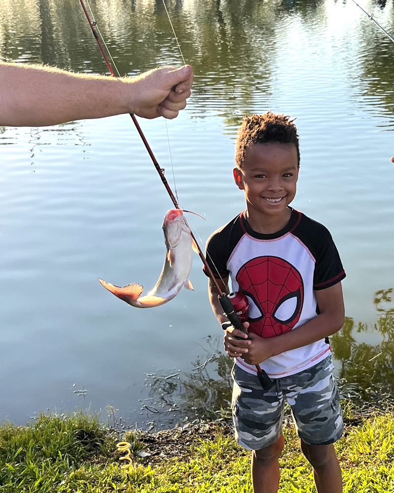 Child fishing at the lake